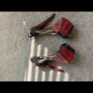 Christian Louboutins RED BOTTOMS